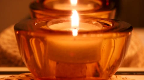 Close-up of candle in red glass container Stock Footage 35487391
