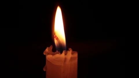 Close-up of the candlelight in the darkness Stock Footage 124863403