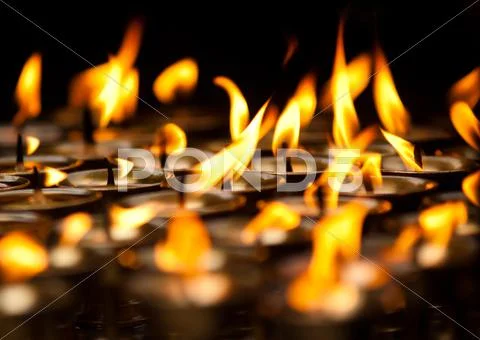 Close up of candles at buddhist temple Stock Illustration