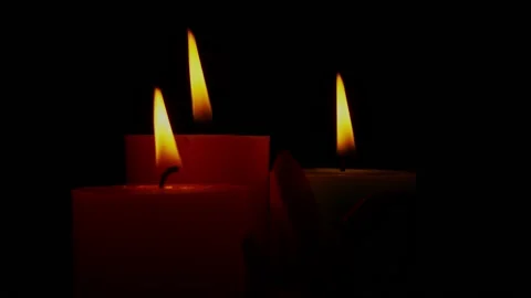 Close up Candles Flame Gently Swaying In The Wind. Stockbeeldmateriaal 195931991