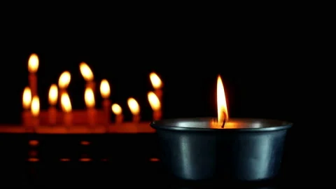 Close up candles flame Isolated on dark Background. Stock Footage 151490667