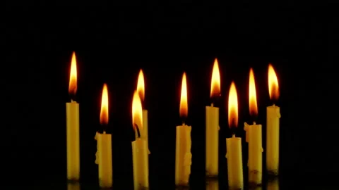 Close up candles flame Isolated on darkness Background. Stock Footage 147734928