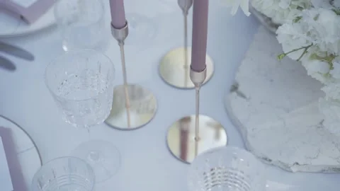 Close-up of candles on the white wedding table Stock Footage 220534244