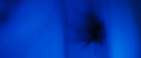 Close up of a cannabis leaf drawing with dark blue lighting in the background Stock Footage 121423693
