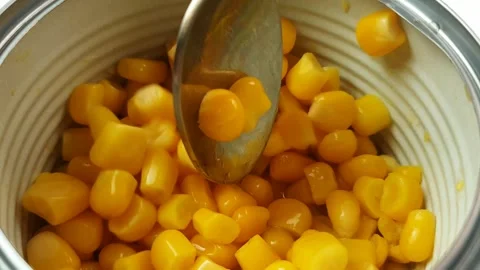 Close-up of canned corn in a jar. Corn, long-life vegetables. 库存影片 335216151