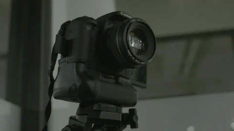 Close Up of a Canon DSLR Camera Mounted on a Tripod Stock Footage 343880143