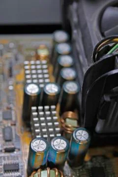 Close-up of capacitors on a circuit board, computer otherboard Stock Photos