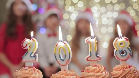 Close-up of capkakes with candles 2018 Stock Footage 83301858