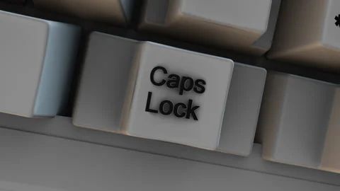 Close-up of Caps Lock Button Key on Computer Keyboard. Stock Footage 333876734