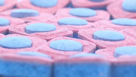Close-up of capsules for washing dishes in an automatic machine. Dishwashing Stock-Footage 253112722