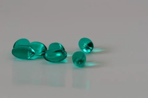 Close up capsules on the white background. Stock Photos