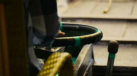 Close up of Captain sailing using steering wheel of traditional boat Stock Footage 55399222