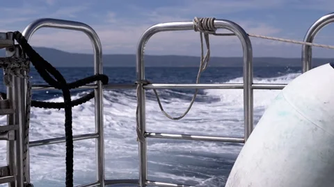 Close up, Captivating Boat Wake on Ocean Waves Stock Footage 313872605