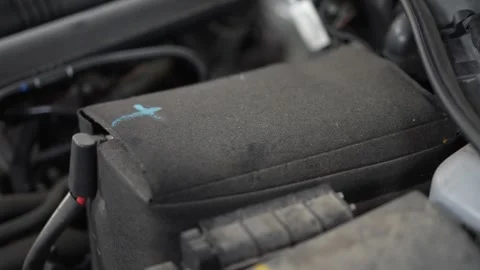 Close-up of a car battery inside black thermal insulation cover. Stock Footage 345709187