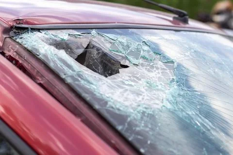 Close-up of a car with a broken windshield after a fatal crash. Consequence o Stock-Fotos