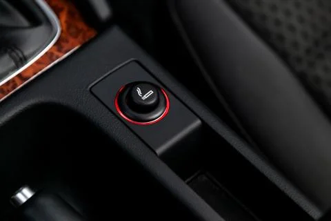 .Close up of the car cigarette lighter socket.modern car interior: parts, but Stock Photos