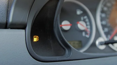 Close-up car dash board petrol meter, fuel gauge. Fuel reserve indicator.. Stock Footage 123501666
