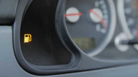 Close-up car dash board petrol meter, fuel gauge. Fuel reserve indicator.. Stock Footage 123501674