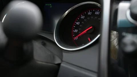 Close-up of a car dashboard as the ignition is switched on Video stock 323249289