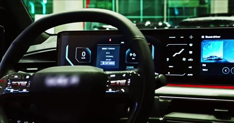 Close-up of car dashboard showing how to switch to Trail drive mode. Driver Stock Footage 304090349