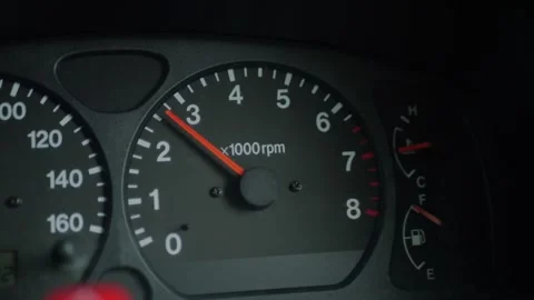 Close-up of a car dashboard with the tachometer needle... Stock Footage 339101516