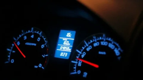 Close-up of a car dashboard while driving at night Stock Footage 80231614