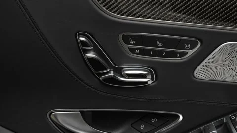 Close up of car door control buttons White 2017 Mercedes-Benz S-Class S63 AMG Stock Footage 159933954