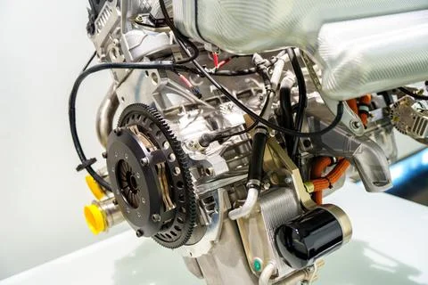 A close-up of a car engine with a focus on the clutch and flywheel. The engin Stock Photos