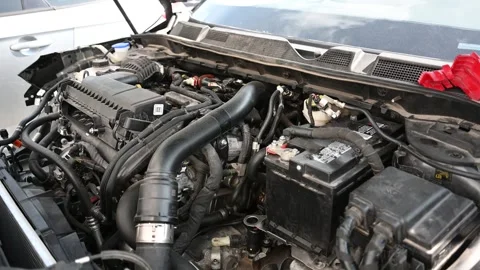 Close-Up of a Car Engine with Open Hood, Showing Various Components Stock Footage 311002511