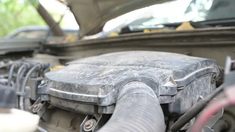 Close-up of a car engine starting with the sound of the starter and revving RPMs Stock Footage 319505253