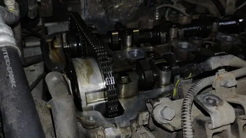Close-up of car engine timing chain and cover assembly Stock Footage 347085692