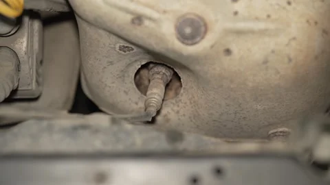 A close up of a car exhaust oxygen sensor lambda probe. Stock-Footage 342729954