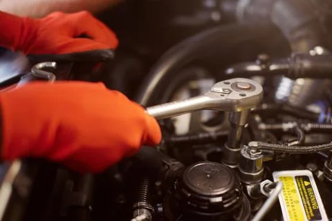 Close up of a car fixing process in the workshop. Stock Photos