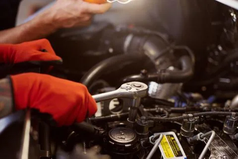 Close up of a car fixing process in the workshop. Stock Photos