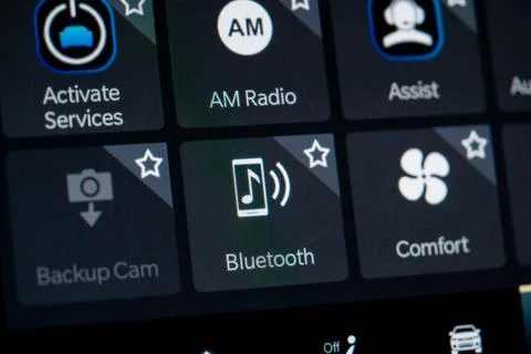 Close up of car infotainment screen with Bluetooth option. Toronto, Canada - Stock Photos