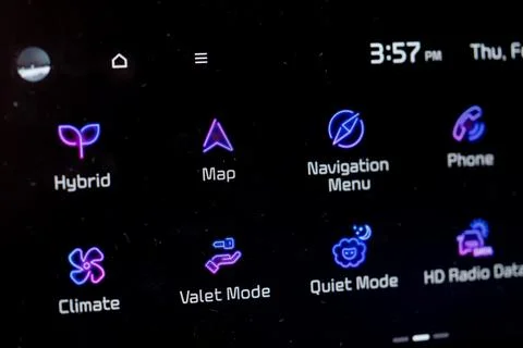 Close up of car infotainment screen with navigation and hybrid menu Foto stock