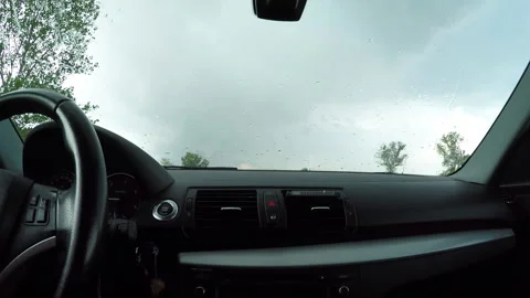 Close up Car Interior During Rainy Day on the Side of the Dirt Road Video stock 221842162
