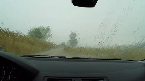 Close up Car Interior During Rainy Day on the side of the dirt road 5 Stock-Footage 221842458