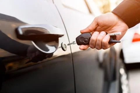 Close-up of car keys. The driver opens and closes the auto. In the residential Stock Photos