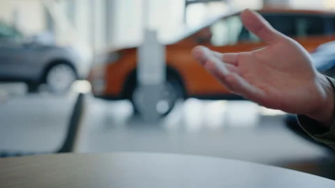 Close-up of car keys in hand. A new car. Dealership Stock Footage 200931069
