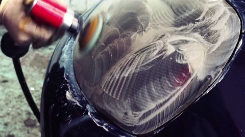 Close up car lamp or front headlight polishing, renewed headlamp Vídeos de archivo 73948429