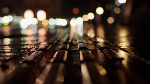 Close up car lights trail unfocused wet asphalt road traffic at night city Video stock 274473320