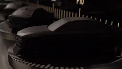 Close-up of a car model spinning on a platform	 Video stock 311926606
