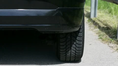 Close up on car parked on sidewalk Stock Footage 28961448