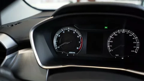 Close up of car speed meter. Interior of a modern car, dashboard with an engine Stock Footage 157010523
