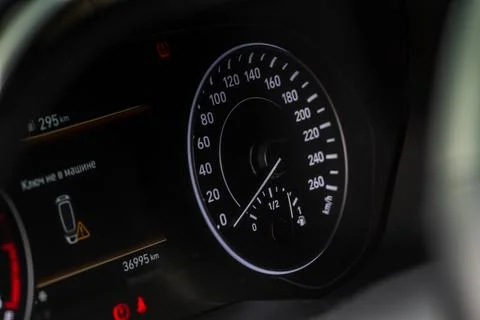 Close up of a car speedometer. Car speedometer guage. Translation "Key is not Stock Photos