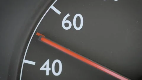 Close up of car speedometer needle at low city speed limit 50km/h mp/h Stock Footage 338087742
