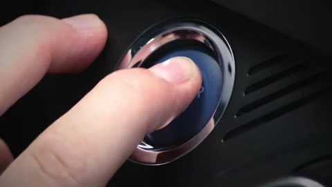 Close up of a car start engine button pressed Stock Footage 287341388