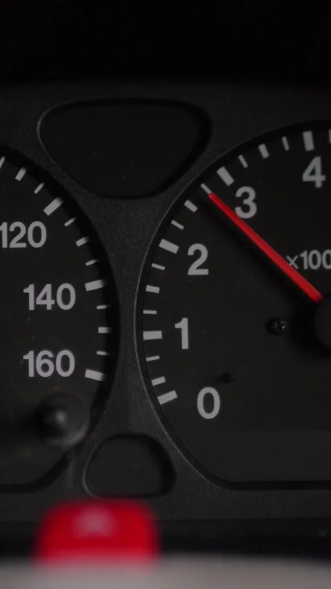 Close-up of car tachometer needle rising and falling on dashboard... Stock Footage 344455287