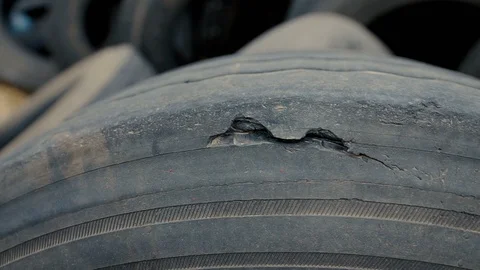 Close-up on a car tire with damage Video stock 92192356